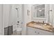 Bathroom with granite countertop vanity and tub with shower at 5315 Mccormick Rd, Durham, NC 27713
