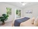 Bright bedroom with slider to backyard deck at 5315 Mccormick Rd, Durham, NC 27713