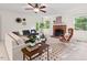 Comfortable living room with natural light, a fireplace, and stylish furnishings at 5315 Mccormick Rd, Durham, NC 27713