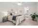 Relaxing main bedroom with soft carpet, ample natural light, and ensuite bathroom at 5315 Mccormick Rd, Durham, NC 27713