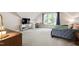 Bedroom featuring a large window, desk, and comfortable furnishings at 553 Lake Gaston Dr, Fuquay Varina, NC 27526