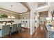 Dining room features hardwood floors, modern lighting, and an open layout at 553 Lake Gaston Dr, Fuquay Varina, NC 27526