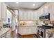 Updated kitchen with stainless steel appliances, granite countertops and breakfast bar at 553 Lake Gaston Dr, Fuquay Varina, NC 27526