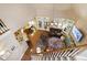 Bright living room with open floor plan features hardwood floors and natural light at 553 Lake Gaston Dr, Fuquay Varina, NC 27526