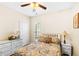 This bedroom has a white dresser, wood floors, and an inviting atmosphere at 575 Tomkins Loop, Cary, NC 27519