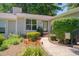 Charming home exterior featuring a well-manicured lawn and inviting walkway at 5905 Westcreek Pl, Raleigh, NC 27606