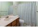 Cozy bathroom with a pastel color scheme, tiled floor and a neutral vanity at 6 Parsons Chase Ln, Durham, NC 27713