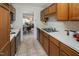 Well-organized kitchen leading to dining and living areas, with ample counter and cabinet space at 6 Parsons Chase Ln, Durham, NC 27713