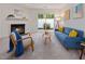 Inviting living room featuring a fireplace, comfortable seating, and access to an outdoor area at 6 Parsons Chase Ln, Durham, NC 27713