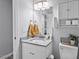 Bathroom featuring a vanity with granite counters and cabinet with storage at 611 Quartz Dr, Durham, NC 27703