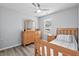 Bedroom featuring hardwood floors and natural lighting at 611 Quartz Dr, Durham, NC 27703