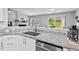 Kitchen featuring granite countertops, stainless steel appliances, and a seamless layout at 611 Quartz Dr, Durham, NC 27703