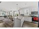 Bright, open-concept kitchen featuring modern appliances and seamless flow to the dining area at 6300 Pleasant Pines Dr # 101, Raleigh, NC 27613