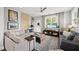 Comfortable living room with ample seating, stylish decor, and a bright window at 6300 Pleasant Pines Dr # 101, Raleigh, NC 27613