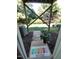 Outdoor entryway with wooden support beams and stone pavers leading to the backyard at 650 Ganyard Farm Way # 32, Durham, NC 27703