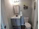 Updated bathroom with a vanity and decorative wall accents, tiled floor, and toilet at 650 Ganyard Farm Way # 32, Durham, NC 27703