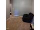 Bedroom features a dark recliner and gray walls at 650 Ganyard Farm Way # 32, Durham, NC 27703