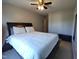 Bedroom with comfortable bed, ceiling fan, and neutral tones for a relaxing atmosphere at 650 Ganyard Farm Way # 32, Durham, NC 27703