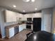 Spacious kitchen features stainless steel appliances, ample counter space and bright, recessed lighting at 650 Ganyard Farm Way # 32, Durham, NC 27703