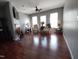 Elegant living room with hardwood floors, neutral walls, and ample natural light at 650 Ganyard Farm Way # 32, Durham, NC 27703
