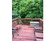 View of deck featuring a swing, bench, chair and storage container at 651 Berry Chase Way, Cary, NC 27519