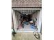 An inside view of the garage reveals cluttered storage at 651 Berry Chase Way, Cary, NC 27519