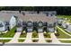 Aerial view of modern townhomes with landscaped yards and convenient parking at 706 Ambrose Hill Lane Ln, Wendell, NC 27591