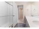 Modern bathroom featuring a glass-enclosed shower, double vanity and neutral paint at 706 Ambrose Hill Lane Ln, Wendell, NC 27591