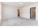Bright and airy bedroom featuring plush carpeting and neutral paint at 706 Ambrose Hill Lane Ln, Wendell, NC 27591