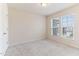 Bright bedroom with natural light and neutral carpeting, perfect for relaxation at 706 Ambrose Hill Lane Ln, Wendell, NC 27591