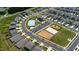 Overhead view featuring the pool, volleyball court, playground, and parking of the community center at 706 Ambrose Hill Lane Ln, Wendell, NC 27591