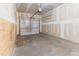 Spacious garage featuring an automatic door opener and bare drywall at 706 Ambrose Hill Lane Ln, Wendell, NC 27591