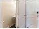 Clean and modern half bathroom featuring a pedestal sink and neutral paint at 706 Ambrose Hill Lane Ln, Wendell, NC 27591