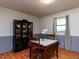 Dining room features a wooden table, chairs, and a display cabinet at 712 E Horne St, Clayton, NC 27520