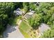 Overhead view of a home with mature trees and lush greenery at 716 Sandra St, Garner, NC 27529