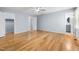 Spacious bedroom features include hardwood floors, neutral walls, and a ceiling fan at 716 Sandra St, Garner, NC 27529