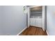Laundry room features an octagonal window, a washer and dryer, with white walls at 716 Sandra St, Garner, NC 27529