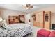 Comfortable bedroom featuring built-in shelves and a ceiling fan at 74 Fountain Dr, Clayton, NC 27520