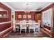 Elegant dining room featuring a large table, stylish chandelier, and sophisticated decor at 74 Fountain Dr, Clayton, NC 27520