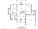 Detailed floor plan of the first floor showcasing the layout, dimensions, and room names including a living room and primary bedroom at 74 Fountain Dr, Clayton, NC 27520