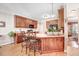 Eat-in kitchen featuring granite countertops and a breakfast bar at 74 Fountain Dr, Clayton, NC 27520