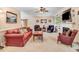 Spacious living room with neutral carpet, fireplace, and ample seating at 74 Fountain Dr, Clayton, NC 27520
