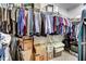 Spacious walk-in closet features ample storage with shelving and hanging space at 74 Fountain Dr, Clayton, NC 27520