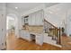 Entertainer's area with wine storage and stairs to the main floor at 7917 Rooksley Ct, Raleigh, NC 27615