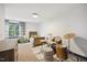 Bright bedroom with a bed, drum set and a window bringing in natural light at 7917 Rooksley Ct, Raleigh, NC 27615