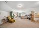 Expansive bedroom with vaulted ceiling, comfortable sitting area and natural light at 7917 Rooksley Ct, Raleigh, NC 27615