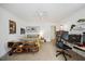 Cozy bedroom with modern decor, a ceiling fan, and a workspace for productivity at 7917 Rooksley Ct, Raleigh, NC 27615