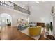 Spacious living room with high ceilings, second story loft and fireplace at 7917 Rooksley Ct, Raleigh, NC 27615