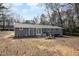 Inviting home with backyard and patio perfect for outdoor relaxation and entertaining in a serene, private setting at 810 Grovemont Rd, Raleigh, NC 27603