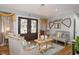 Cozy living room with stylish furniture, hardwood floors, and elegant decor at 810 Grovemont Rd, Raleigh, NC 27603